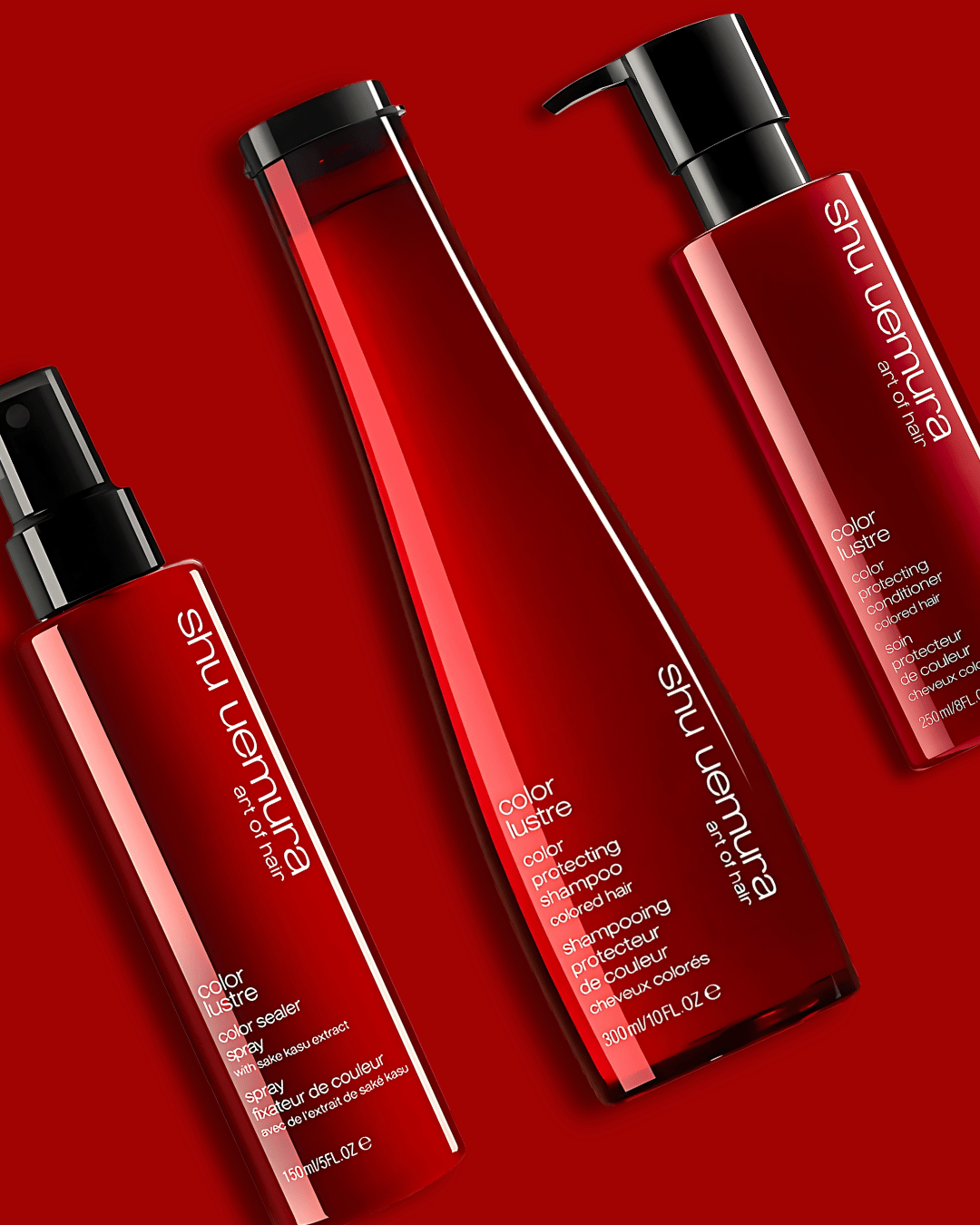 Shu Uemura hair care products on a red background